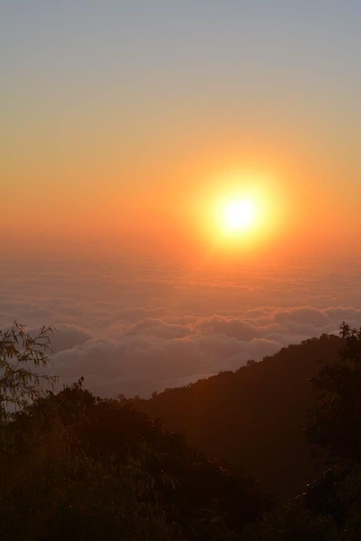 Golden sunrise over Mount Kanchenjunga viewed from Tiger Hill in Darjeeling