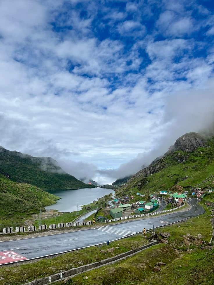 Glacial Tsomgo Lake surrounded by snow-capped peaks in Gangtok Sikkim