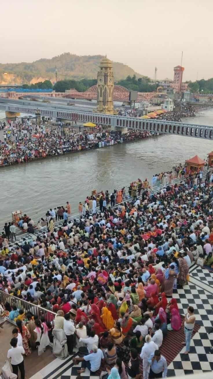 Devotees and priests performing the spiritual evening Ganga Aarti at Har Ki Pauri ghat